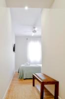 Posteľ alebo postele v izbe v ubytovaní Urban Suites El Postigo