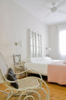 Posteľ alebo postele v izbe v ubytovaní Urban Suites El Postigo