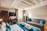 Telewizja i/lub zestaw kina domowego w obiekcie Hotel 55 Fifty-Five - Maison d'Art Collection