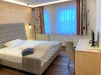 Postel nebo postele na pokoji v ubytování Hotel San Marco
