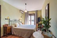 Cama o camas de una habitación en Hostal El Escudo de Mijas