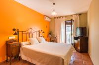Cama o camas de una habitación en Hostal El Escudo de Mijas