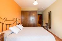 Cama o camas de una habitación en Hostal El Escudo de Mijas