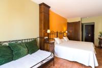 Cama o camas de una habitación en Hostal El Escudo de Mijas