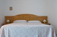 Postel nebo postele na pokoji v ubytování Albergo Villa Mario