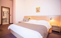 Posteľ alebo postele v izbe v ubytovaní Hotel More