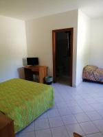 A bed or beds in a room at Bed and Breakfast "POGGIO MARANO"