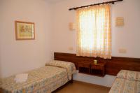 A bed or beds in a room at Menorca Bonavista