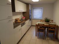 Kuchyň nebo kuchyňský kout v ubytování Ferienwohnung Bonndorf