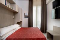 Posteľ alebo postele v izbe v ubytovaní Hotel Zenith