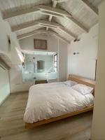 Postel nebo postele na pokoji v ubytování Arachova Vip smart chalet-Villa Eva 1
