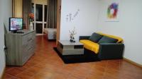 TV a/nebo společenská místnost v ubytování Lindo Apartamento Villa