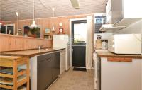 Kuchyň nebo kuchyňský kout v ubytování Holiday Home Fanø 22
