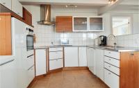 Kuchyň nebo kuchyňský kout v ubytování Holiday Apartment Rudkøbing 06