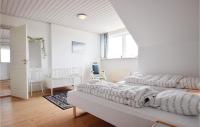 Postel nebo postele na pokoji v ubytování Holiday Apartment Rudkøbing 06