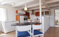 Kuchyň nebo kuchyňský kout v ubytování Holiday Apartment Rudkøbing 06