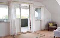 Postel nebo postele na pokoji v ubytování Holiday Apartment Rudkøbing 06