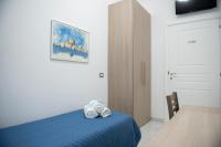 Łóżko lub łóżka w pokoju w obiekcie Stabia Dream Rooms