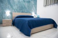 Łóżko lub łóżka w pokoju w obiekcie Stabia Dream Rooms
