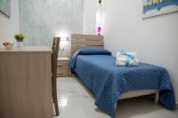 Łóżko lub łóżka w pokoju w obiekcie Stabia Dream Rooms