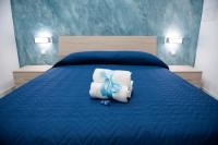 Łóżko lub łóżka w pokoju w obiekcie Stabia Dream Rooms