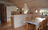 Kuchyň nebo kuchyňský kout v ubytování Holiday Home Nøddehaven Oksbøl Iv