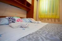 Posteľ alebo postele v izbe v ubytovaní Holiday Escape From City Center