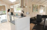 Kuchyň nebo kuchyňský kout v ubytování Holiday Home Pælen Stege I