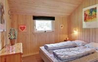 Postel nebo postele na pokoji v ubytování Holiday Home Nøddehaven Oksbøl Iv