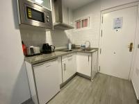Kuchyň nebo kuchyňský kout v ubytování Honeymoon Apartments