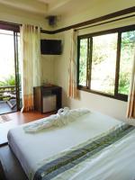 Postel nebo postele na pokoji v ubytování Pai My Guest Resort - SHA Plus