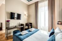 Łóżko lub łóżka w pokoju w obiekcie Hotel 55 Fifty-Five - Maison d'Art Collection