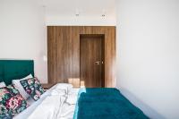 Posteľ alebo postele v izbe v ubytovaní Homewell Apartments Dominikańska