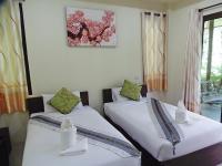 Postel nebo postele na pokoji v ubytování Pai My Guest Resort - SHA Plus