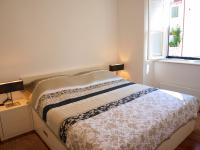 Postel nebo postele na pokoji v ubytování Miró Studio Apartments Dubrovnik