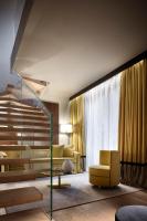 A bed or beds in a room at Speronari Suites