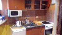 A kitchen or kitchenette at chata Ivka Leštiny