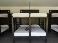 Postel nebo postele na pokoji v ubytování Albergue Casa Sueño