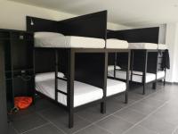 Postel nebo postele na pokoji v ubytování Albergue Casa Sueño
