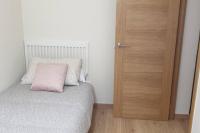 Postel nebo postele na pokoji v ubytování Alojamiento ideal en Santiago