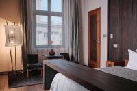 Łóżko lub łóżka w pokoju w obiekcie Hotel Monopol