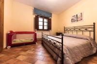 Posteľ alebo postele v izbe v ubytovaní Casa Sirio