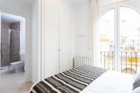 Postel nebo postele na pokoji v ubytování Genteel Home Mateos Gago