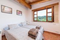 Posteľ alebo postele v izbe v ubytovaní Dos Villas