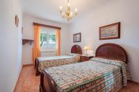 Postel nebo postele na pokoji v ubytování Villa en Son Gall Ciutadella