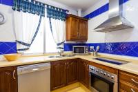 Kuchyň nebo kuchyňský kout v ubytování Duplex A Fontanilla