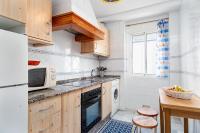 Kuchyň nebo kuchyňský kout v ubytování Apartamento Antonia
