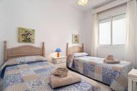 Postel nebo postele na pokoji v ubytování Apartamento Antonia