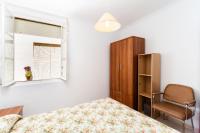 A bed or beds in a room at Luminoso apartamento en Cadiz
