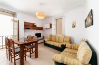 A seating area at Luminoso apartamento en Cadiz